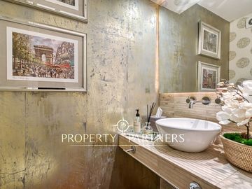 Exclusivo depto remodelado con jardín en parque privado