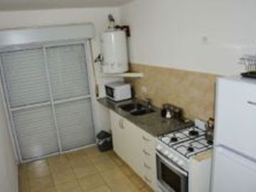Departamento en alquiler temporario de 1 dormitorio c/ cochera en Universitario