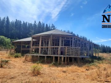 Terreno de 12.500 mts2 con cabaña en construcción se vende