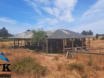 Terreno de 12.500 mts2 con cabaña en construcción se vende