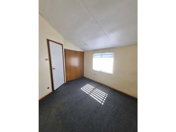 SE VENDE SITIO CON 2 CASAS PARA INVERSION.