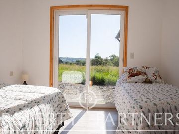Casa en Panguipulli en Parcela  a solo 5 minutos del Centro de Panguipulli. Venta disponible Crédito Hipotecario.