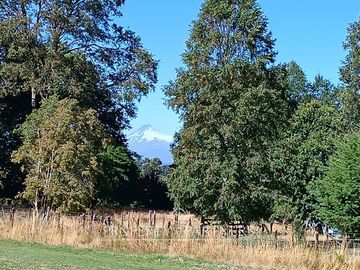 Terreno con linda vista a campos y volcanes