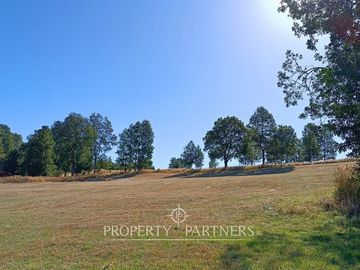 Terreno con linda vista a campos y volcanes