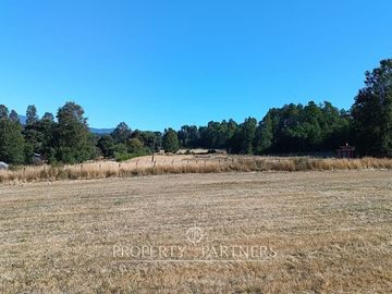 Terreno con linda vista a campos y volcanes