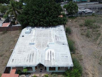 Terreno en venta en Tecomán con edificaciones Habitacionales y uso comercial