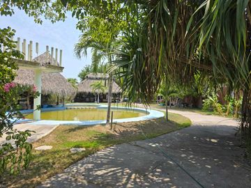 Terreno en venta en Tecomán con edificaciones Habitacionales y uso comercial