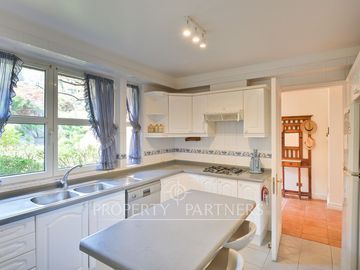 Departamento en primera línea con jardín