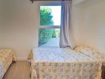 Departamento en primera línea con jardín