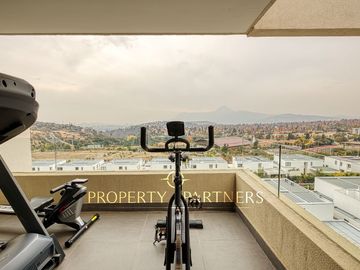 Departamento duplex con vista despejada, San Carlos de Apoquindo