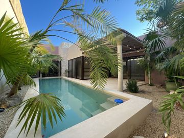 Casa de una planta con acabados rústicos de lujo