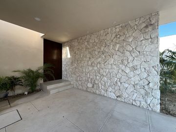 Casa de una planta con acabados rústicos de lujo