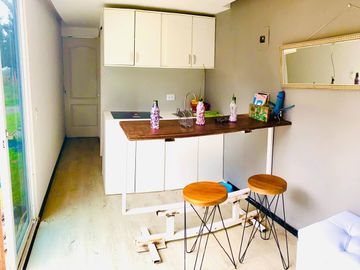 VENTA O CANJE de terreno y casa container. Malchinguí