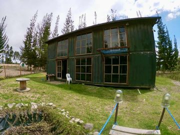 VENTA O CANJE de terreno y casa container. Malchinguí