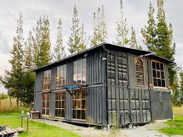 VENTA O CANJE de terreno y casa container. Malchinguí