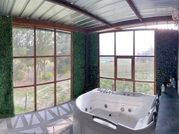 VENTA O CANJE de terreno y casa container. Malchinguí