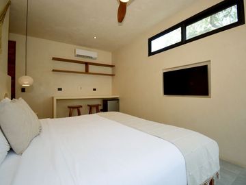 VILLA REFUGIO NATURAL EN TULUM, ESTILO MODERNO DE TRES NIVELES