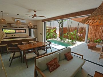 VILLA REFUGIO NATURAL EN TULUM, ESTILO MODERNO DE TRES NIVELES