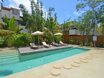 VILLA REFUGIO NATURAL EN TULUM, ESTILO MODERNO DE TRES NIVELES