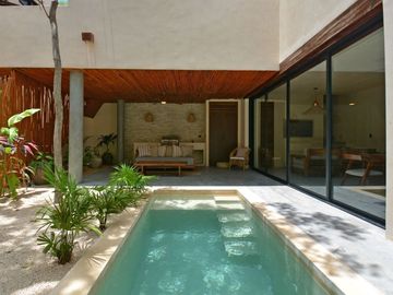 VILLA REFUGIO NATURAL EN TULUM, ESTILO MODERNO DE TRES NIVELES