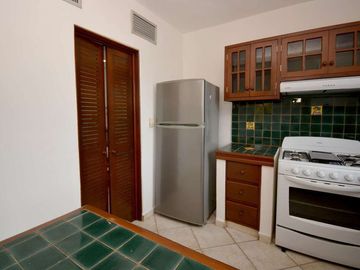 CAUTIVADOR DEPARTAMENTO ESTILO MEXICANO EN EL CORAZÓN DE PLAYA DEL CARMEN