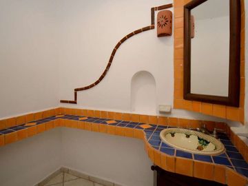 CAUTIVADOR DEPARTAMENTO ESTILO MEXICANO EN EL CORAZÓN DE PLAYA DEL CARMEN