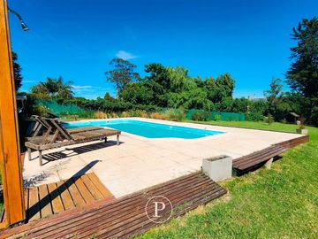 Casa de campo y cabañas en La Peregrina