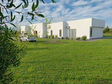 PARCELA DE 5000 M2 CON CASA DE 200 MT2 EN CONDOMINIO