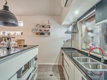 Venta departamento 4 ambientes con 2 cocheras y terraza con quincho