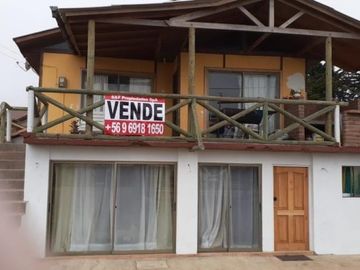 Vendo casa con 3 cabañas y terreno, giro comercial en Iloca.