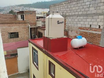 Casa con departamento y amplio terreno en el centro de Pachuca