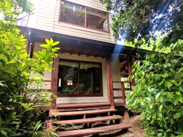 Parcela con casa a paso del lago Villarica
