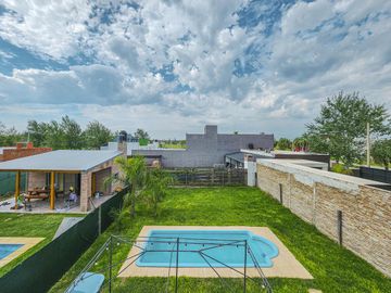 Casa con pileta, Tierra de sueños 3 Roldan