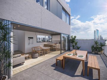 Departamento de 3 ambientes con patio y balcón
