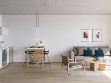 Departamento de 3 ambientes con patio y balcón
