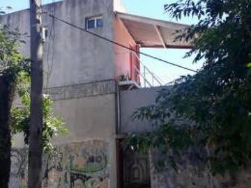 EXCELENTE TERRENO CON CONSTRUCCIÓN