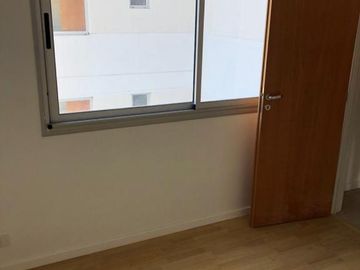 DEPARTAMENTO 2 AMBIENTES CON COCHEERA ZONA CENTRICA