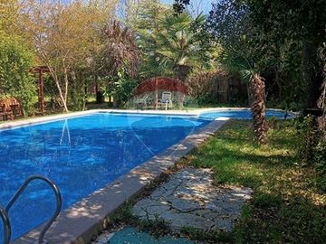 Casa + cabañas en parcela / 10 min Melipilla.