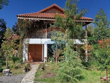 Casa + cabañas en parcela / 10 min Melipilla.
