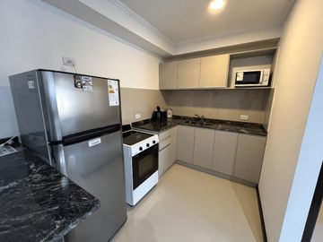 DEPARTAMENTO DE CATEGORIA EN COMPLEJO VENETO VILLAGE EN VILLA PARQUE SIQUIMAN SOBRE RUTA 38 REF: 2038