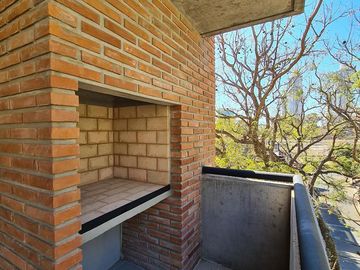 Venta monoambiente a estrenar con patio exclusivo y parrillero