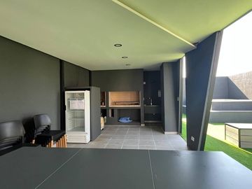 Venta - Departamento de dos dormitorios con cochera y amenities a estrenar en Barrio Martin, Rosario