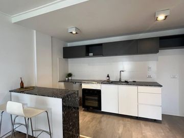 Venta - Departamento de dos dormitorios con cochera y amenities a estrenar en Barrio Martin, Rosario