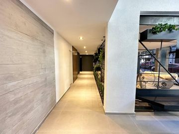 Venta - Departamento de dos dormitorios con cochera y amenities a estrenar en Barrio Martin, Rosario