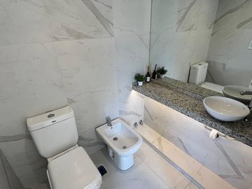Venta - Departamento de dos dormitorios con cochera y amenities a estrenar en Barrio Martin, Rosario
