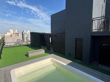 Venta departamento de un dormitorio con cochera y amenities en Barrio Martin, Rosario