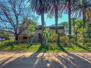 Oportunidad Terreno en Libertador Esquina Corrientes. 16 hectareas y casa de campo