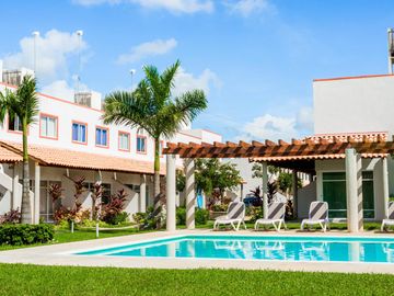 Casa en  Venta en Playa del Carmen 3habitaciones 3 baños 2 platas y Roof
