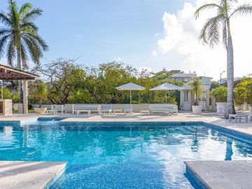 En Venta: Condominio de 3 Recámaras Cerca de la Playa en Playa del Carmen