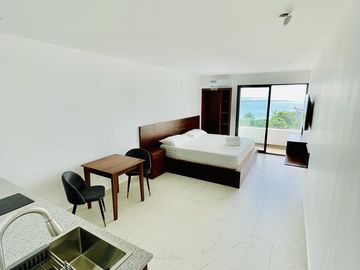 DEPARTAMENTO EN VENTA CON VISTA AL MAR EN PUERTO MORELOS CON ROOFTOP/ALBERCA